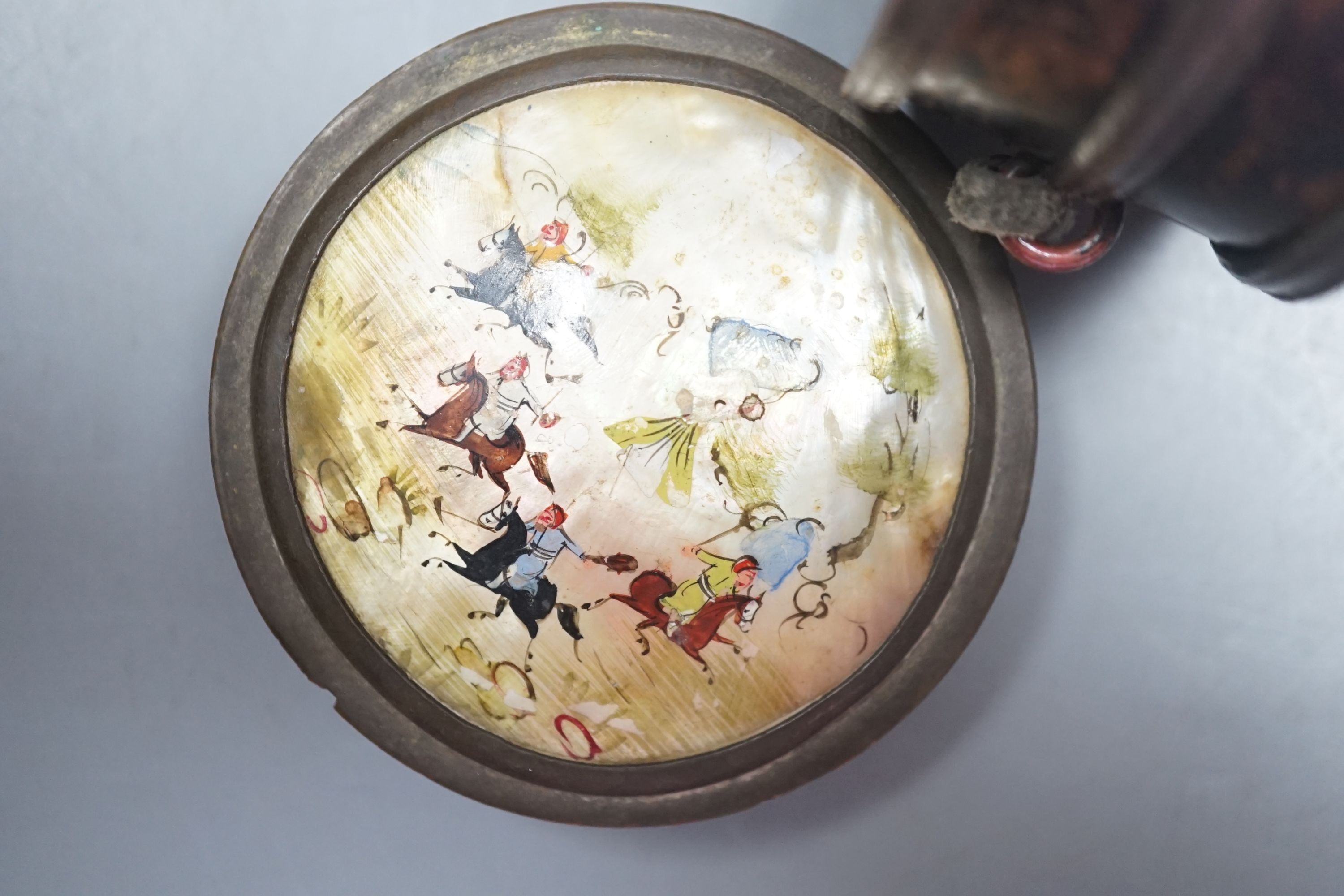 A 19th century Tibetan white metal mounted copper prayer wheel with interior script and a Persian painted mother-of-pearl pill box
